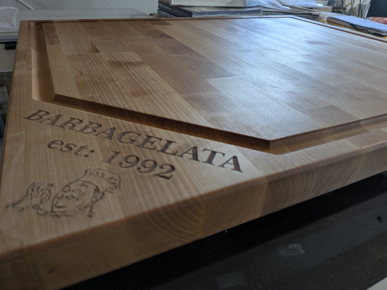 Maple cutting board carved with the Barbagelata family name and est. 1992
