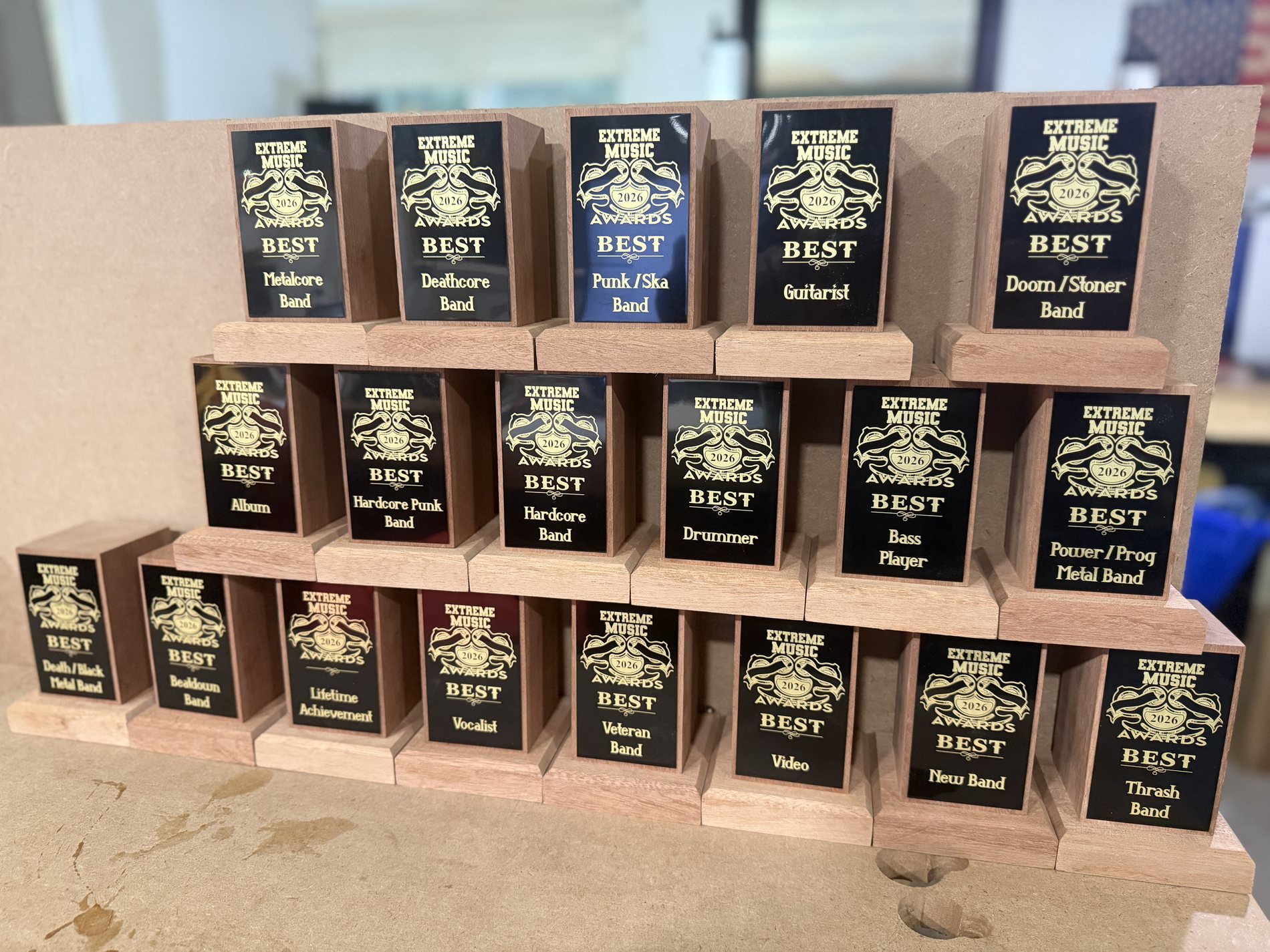 Wall display of engraved recognition awards and trophy plaques