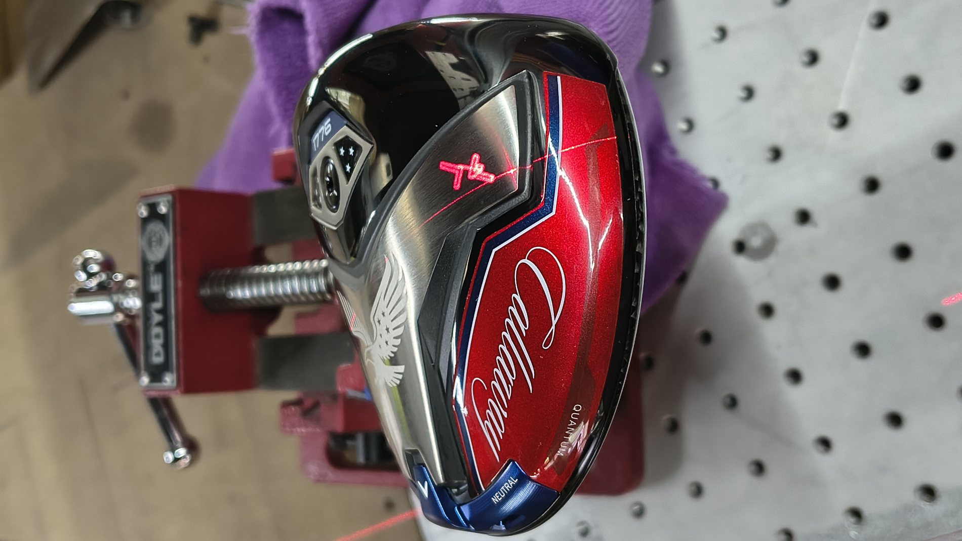 Golf club head laser engraved with a personalized marking