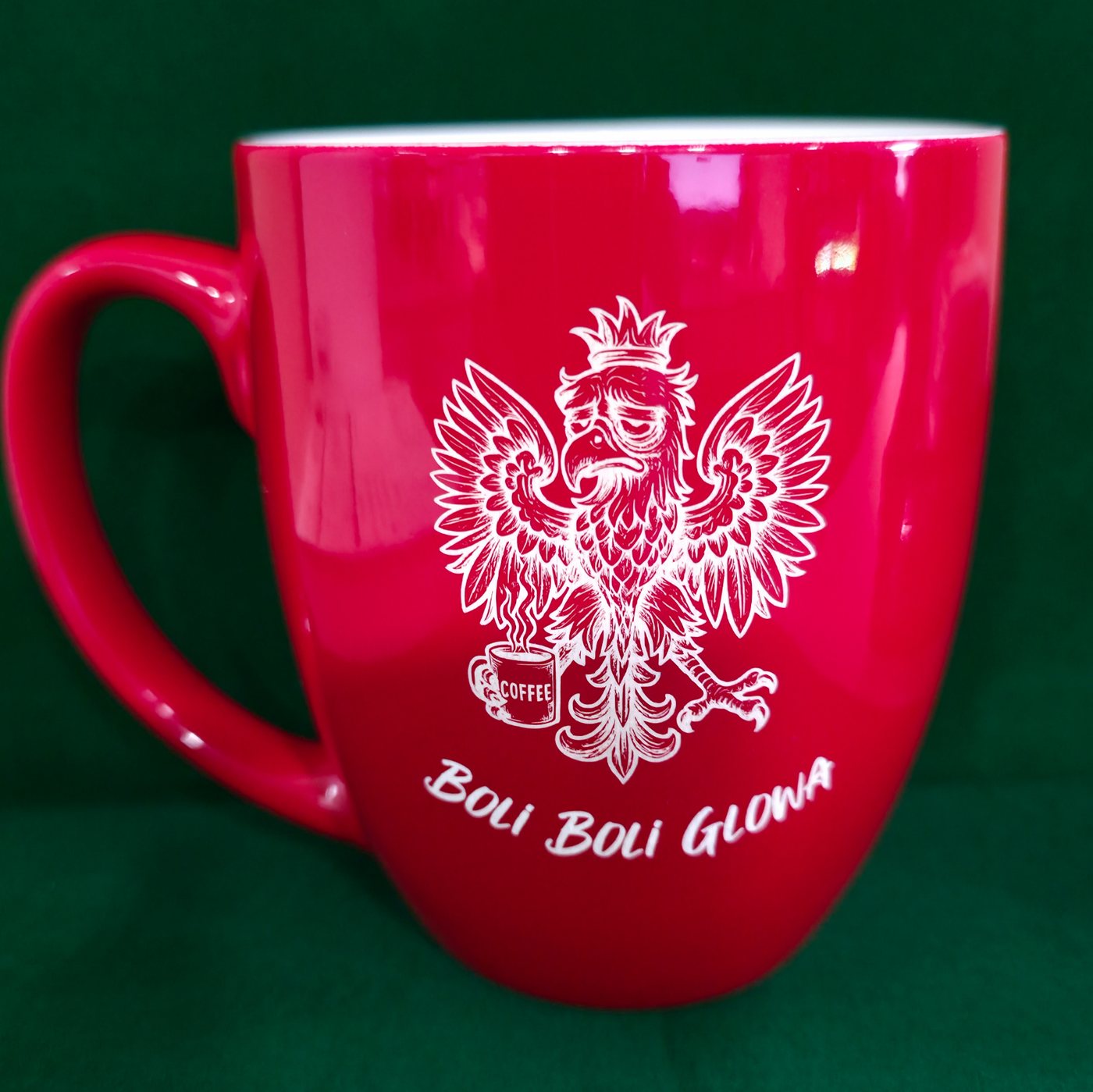 Red ceramic mug laser engraved with a white heraldic eagle crest
