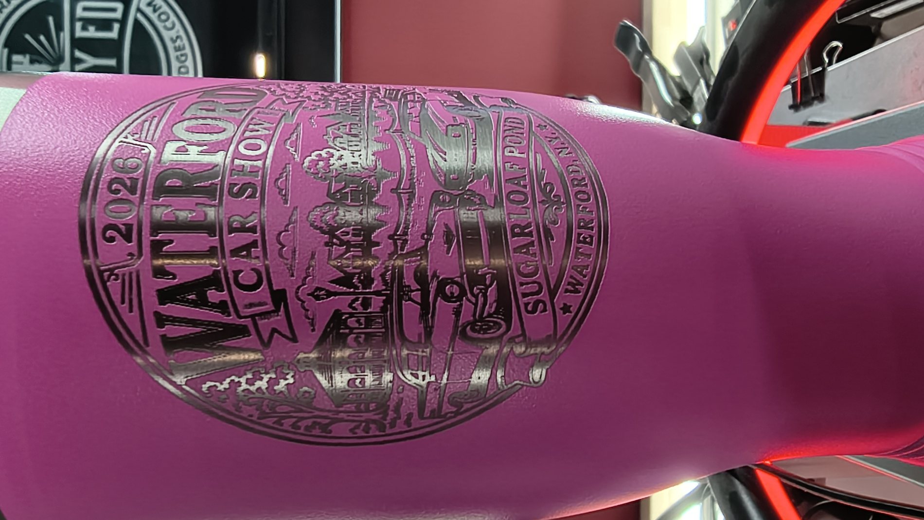 Stainless steel flask engraved with a custom emblem