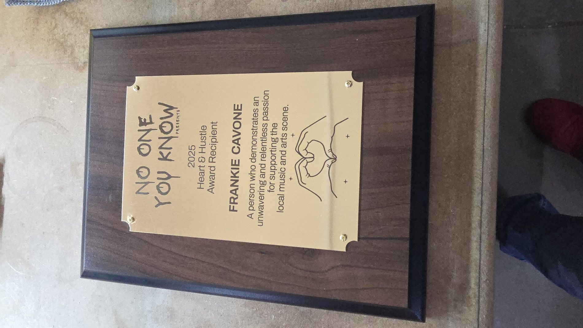 Walnut wood plaque with an engraved presentation plate