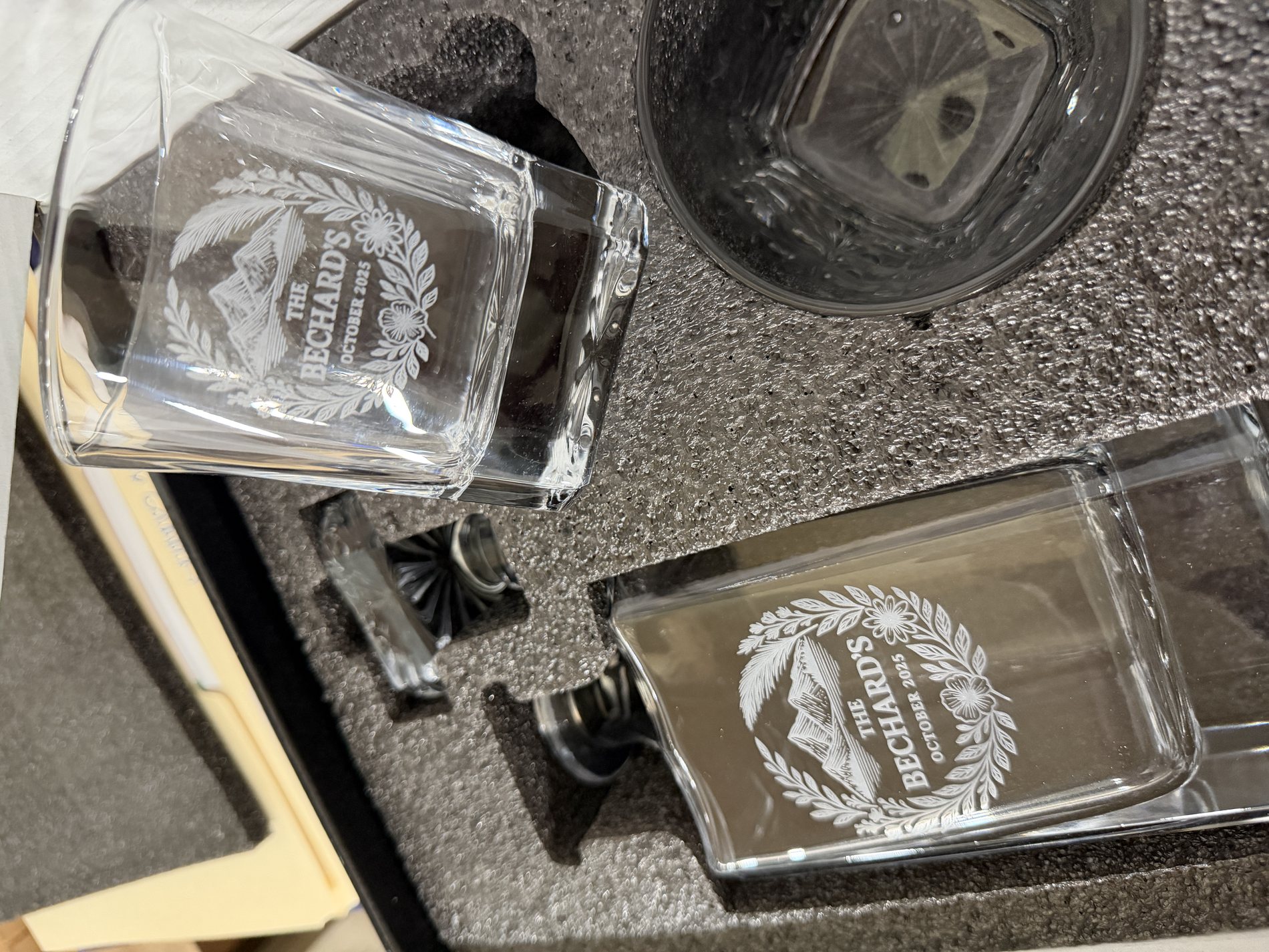 Etched crystal decanter and matching glasses in a presentation case