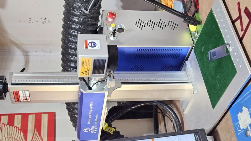 Fiber laser marking unit set up on the bench
